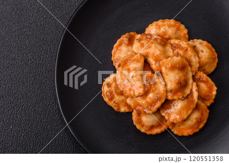 Ravioli with meat or vegetarian with ricotta, salt and spices 120551358
