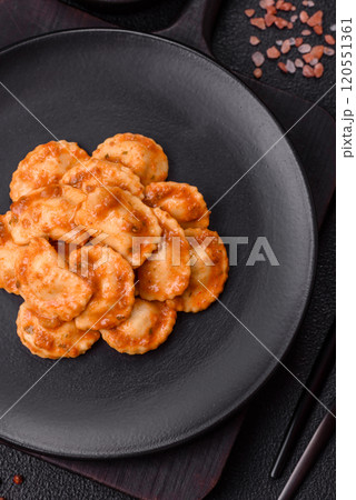 Ravioli with meat or vegetarian with ricotta, salt and spices 120551361