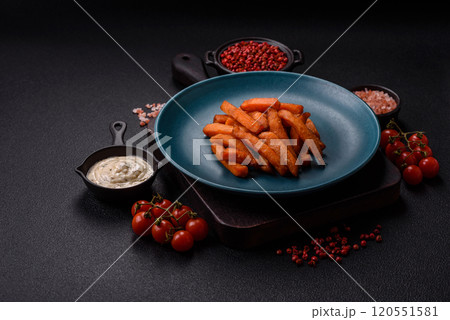 Delicious crispy sweet potato fries with salt, spices and herbs Delicious crispy sweet potato fries with salt, spices and herbs 120551581
