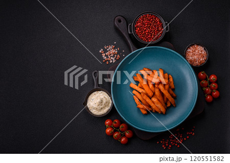 Delicious crispy sweet potato fries with salt, spices and herbs Delicious crispy sweet potato fries with salt, spices and herbs 120551582