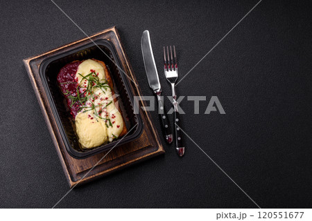 Delicious sweet brioche sandwich with raspberry jam and ricotta cream 120551677