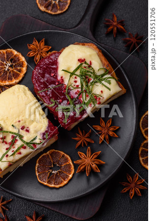 Delicious sweet brioche sandwich with raspberry jam and ricotta cream Delicious sweet brioche sandwich with raspberry jam and ricotta cream 120551706
