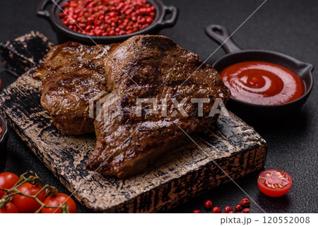 Juicy beef steak grilled with salt, spices and herbs 120552008