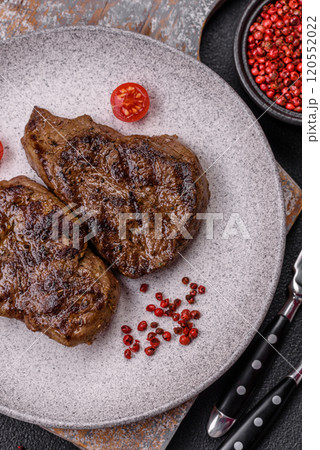 Juicy beef steak grilled with salt, spices and herbs 120552022