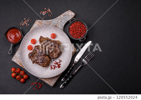 Juicy beef steak grilled with salt, spices and herbs 120552024