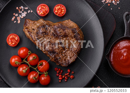 Juicy beef steak grilled with salt, spices and herbs Juicy beef steak grilled with salt, spices and herbs 120552033