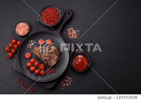 Juicy beef steak grilled with salt, spices and herbs Juicy beef steak grilled with salt, spices and herbs 120552036