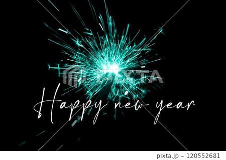 Happy new year turquoise sparkler new years eve countdown. Luxury entertainment celebration turn of the year party time. Premium nightlife visual with glowing light sparks on dark background. 120552681