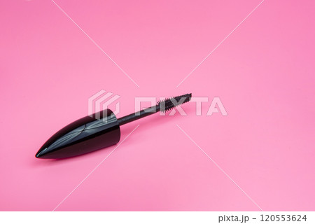 Black tube mascara for lashes make up on pink background 120553624