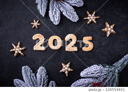 Festive New Year cookies in shape of 2025 120554931