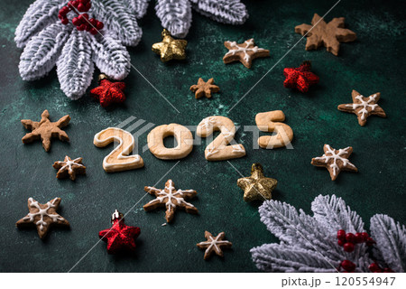 Festive New Year cookies in shape of 2025 Festive New Year cookies in shape of 2025 120554947