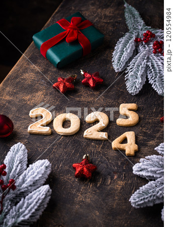 Festive New Year cookies in shape of 2025 Festive New Year cookies in shape of 2025 120554984