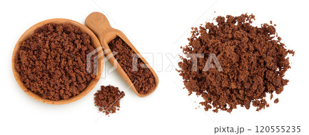 Dark muscovado sugar or Barbados sugar in wooden bowl isolated on white background. Top view. Flat lay 120555235