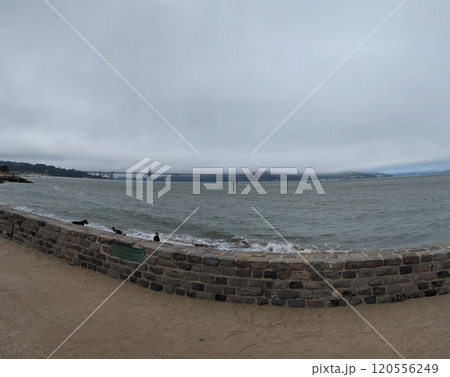 San Francisco, USA - 09.20.2024: Panorama of the San Francisco embankment in autumn cloudy weather San Francisco, USA - 09.20.2024: Panorama of the San Francisco embankment in autumn cloudy weather 120556249