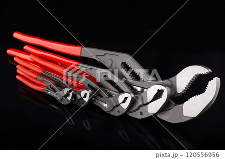 Set of Adjustable Wrenches with Red Handles 120556956