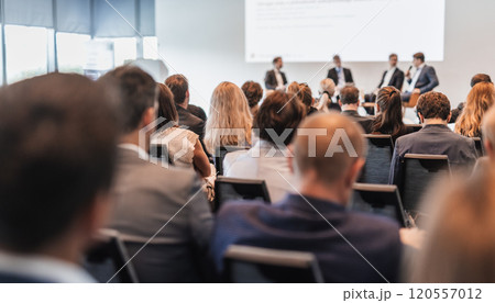 Interview and round table discussion at business convention and presentation. Audience at the conference hall. Business and entrepreneurship symposium. 120557012