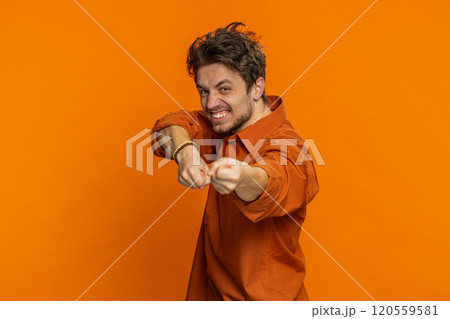 Mime Caucasian man pulling an imaginary unreal invisible rope puts lot of effort success promotion Mime Caucasian man pulling an imaginary unreal invisible rope puts lot of effort success promotion 120559581