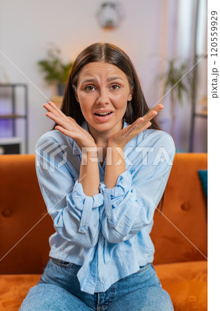 Young woman girl asking why what reason of failure demonstrating disbelief irritation by troubles 120559929