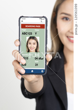 Businesswoman showing electronic boarding pass on smartphone screen. Businesswoman showing electronic boarding pass on smartphone screen. 120561099