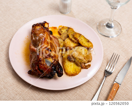 Appetizing pork knuckle served on platter 120562050