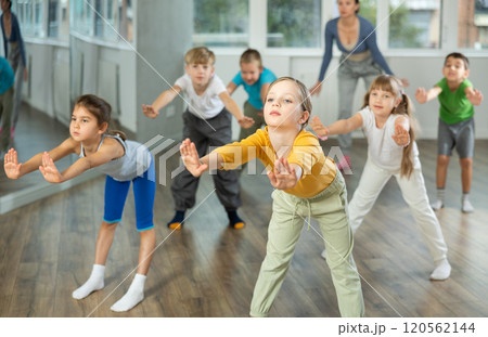 Group of children warming up before dance class 120562144