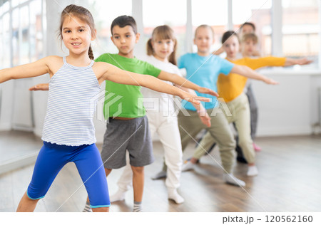 Group of children warming up before dance class 120562160