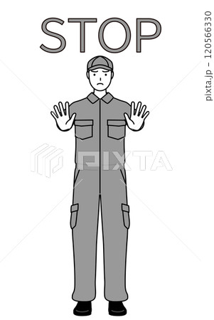 ストップの合図、体の前に手を突き出すつなぎ姿の整備士 ストップの合図、体の前に手を突き出すつなぎ姿の整備士 120566330