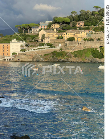 View from rock on Bay of Silence, fishing cove of town of Sestri-Levante, Italy. Tourism and recreation. Ecologically clean nature. Traditional old buildings. Historical center. View from rock on Bay of Silence, fishing cove of town of Sestri-Levante, Italy. Tourism and recreation. Ecologically clean nature. Traditional old buildings. Historical center. 120568085