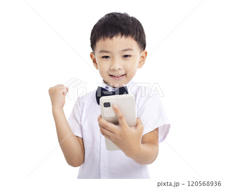 Happy Kid looking at smartphone Happy Kid looking at smartphone 120568936