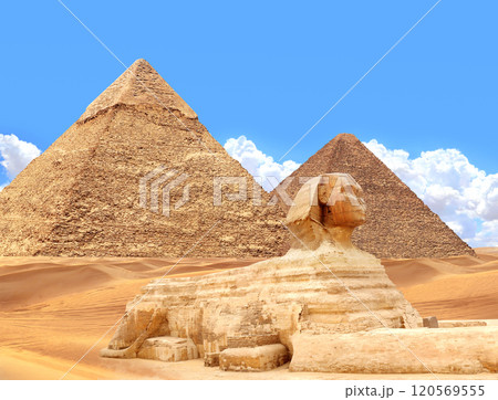 Famous Great Sphinx and pyramids of Chephren, Cheops, Menkaure, Cairo, Egypt. Great Pyramids and statue of Sphinx, mythical creature with head of man and body of lion, Giza complex (Giza Necropolis) 120569555