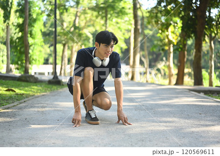 Athlete man in starting position ready for sprint. Goals and motivation concept 120569611