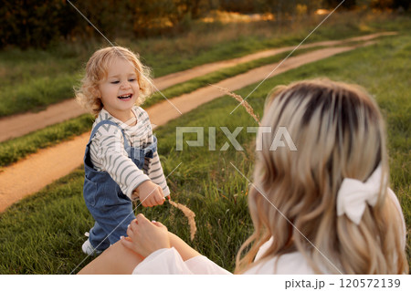 Mother and Child Enjoying Nature Together Mother and Child Enjoying Nature Together 120572139