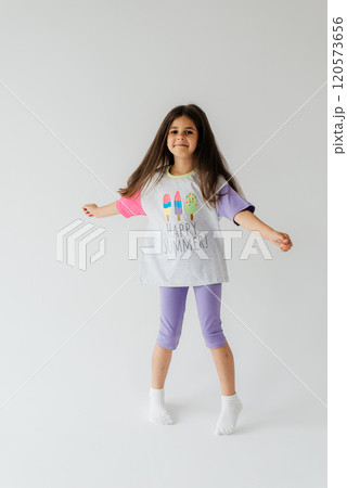 Cute girl 4-5 year old posing in studio Cute girl 4-5 year old posing in studio 120573656