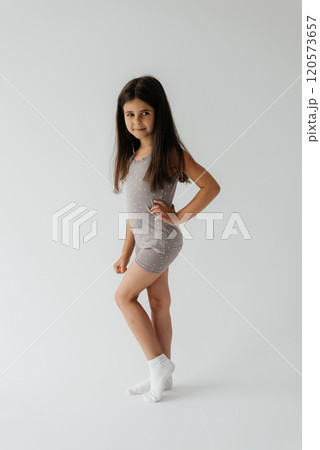 Cute girl 4-5 year old posing in studio Cute girl 4-5 year old posing in studio 120573657