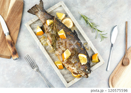 Baked or roasted trout fish. Baked or roasted trout fish. 120575596