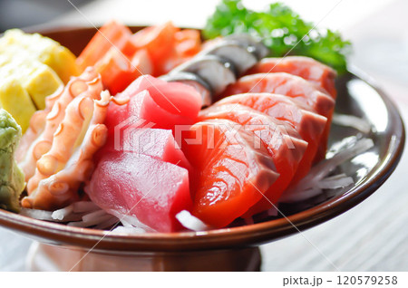 sashimi or raw salmon , Akami and raw tuna or raw mackerel and kanikamaand wasabi or raw fish 120579258
