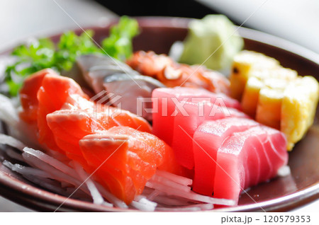 sashimi or raw salmon , Akami and raw tuna or raw mackerel and kanikama and wasabi or raw fish 120579353