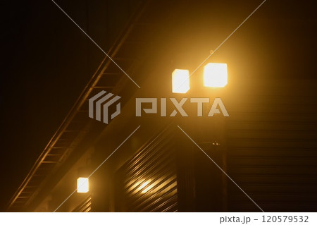 electric lamp on wall of building in the night electric lamp on wall of building in the night 120579532