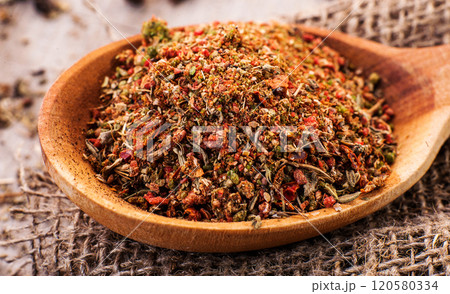 Dry Rub Spice on a Vintage Spoon,wooden table 120580334