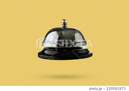 Hotel service bell float on yellow background Hotel service bell float on yellow background 120581873