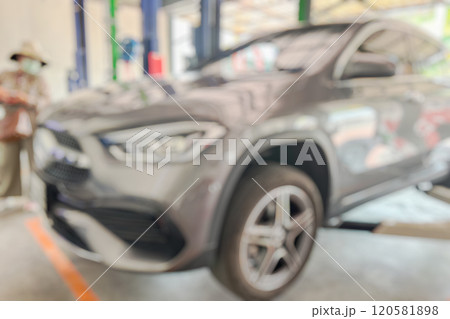 car service centre auto repair workshop blurred background 120581898