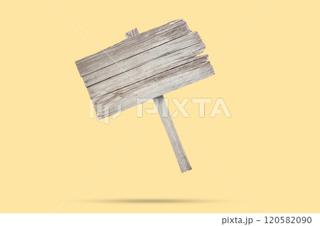 Old wooden sign float on brown background 120582090