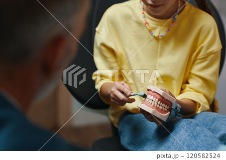 Demonstrating Proper Dental Care Technique with Dentures 120582524