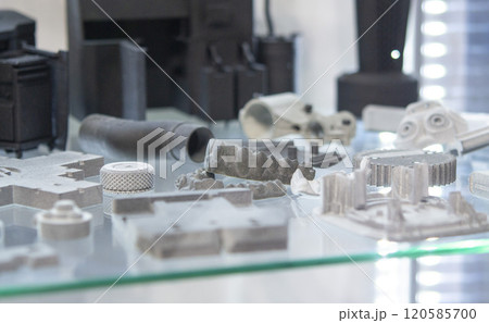 Different object printed on a 3D printer from molten plastic powder. Different model printed on 3D printer from melted black polyamide powder. New additive 3D printing Multi Jet Fusion MJF technology 120585700