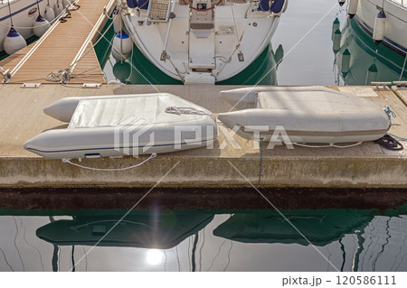 Dinghy Boats at Dock Dinghy Boats at Dock 120586111