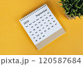 September 2025 desk calendar on yellow background. Directly above. Flat lay 120587684