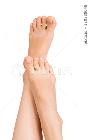 Barefoot foot with relaxed, elegant posture, showcasing healthy skin and nail care. Female model 120588048