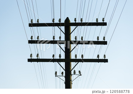 Wooden pole with electric wires 120588778