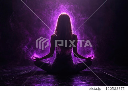 Female silhouette meditating with purple aura in dark atmosphere Female silhouette meditating with purple aura in dark atmosphere 120588875