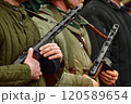 machine gunners with machine guns from the Second World War period in their hands 120589654